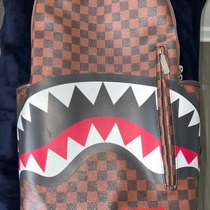 Spray ground book bag. Great condition!